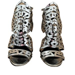 Designer, silver high heels size 7.5.